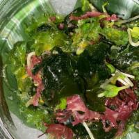 Kaisou Salad · Assorted seaweed from Japan with kaiware sprouts in a sesame oil dressing.