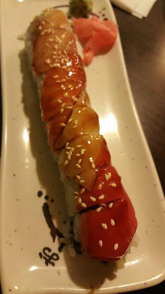 Rainbow Roll · Crab and cucumber inside, tuna, salmon and yellowtail on the outside.