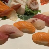 Sushi & Sashimi Combo · Eight pieces sushi, sixteen pieces sashimi.