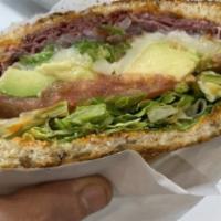 Hot Pastrami Avocado Sandwich · Hot pastrami, mozzarella cheese, spinach, tomatoes, avocado, grilled onions and chipotle may...