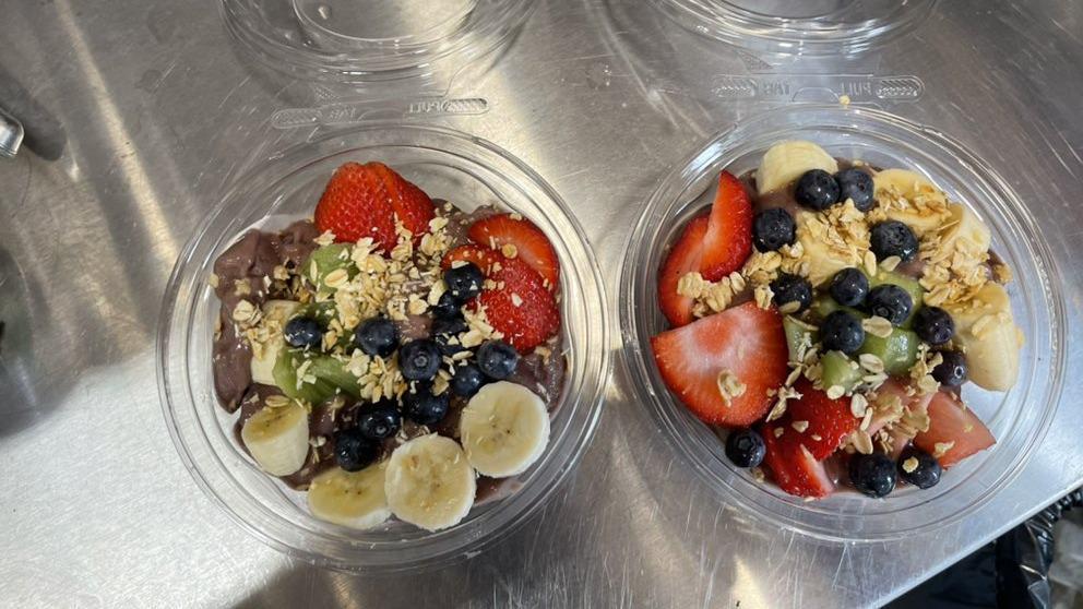 Coco Berry Bowl · Blended organic acai, banana, coconut topped with banana berry, mango, kiwi, granola, chia, and organic shredded coconut.