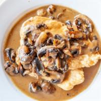 Chicken Marsala · Tender pieces of chicken sauteed with mushrooms Marsala wine in a brown sauce.