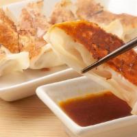 Gyoza Appetizer · Six pieces. Choose chicken or veggie with dumpling sauce.