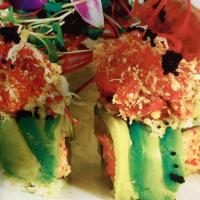 Rocky Roll · Inside: spicy kani shrimp and cucumber. Outside: sliced avocado, spicy crunchy tuna on top.