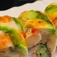 Silver Dream Roll · Inside: king crab and asparagus. Outside: fried banana, avocado and spicy sweet sauce.