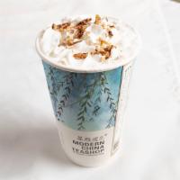 Black Milk Tea W/ Pecan幽兰拿铁 · High quality black tea with special recipe  whole milk,
whipped cream and pecan on top.