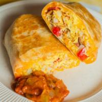 Combo Breakfast Burrito  · Scrambled eggs, bacon, sausage, grilled bell peppers, grilled onions, home fries and cheddar...