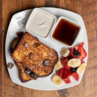 Moroccan French Toast · Battered brioche served with fruits, raisins, almonds, maple syrup and cashew cream.