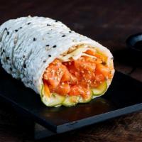 Salmon Sushirrito · Salmon, Yuzu Coleslaw, Cucumber, Sesame Seeds, Sushi Rice and Miso Vinegar Wrapped in Soy Pa...