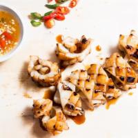 Grilled Calamari · Marinated calamari with Thai spice served with our signature seafood sauce.