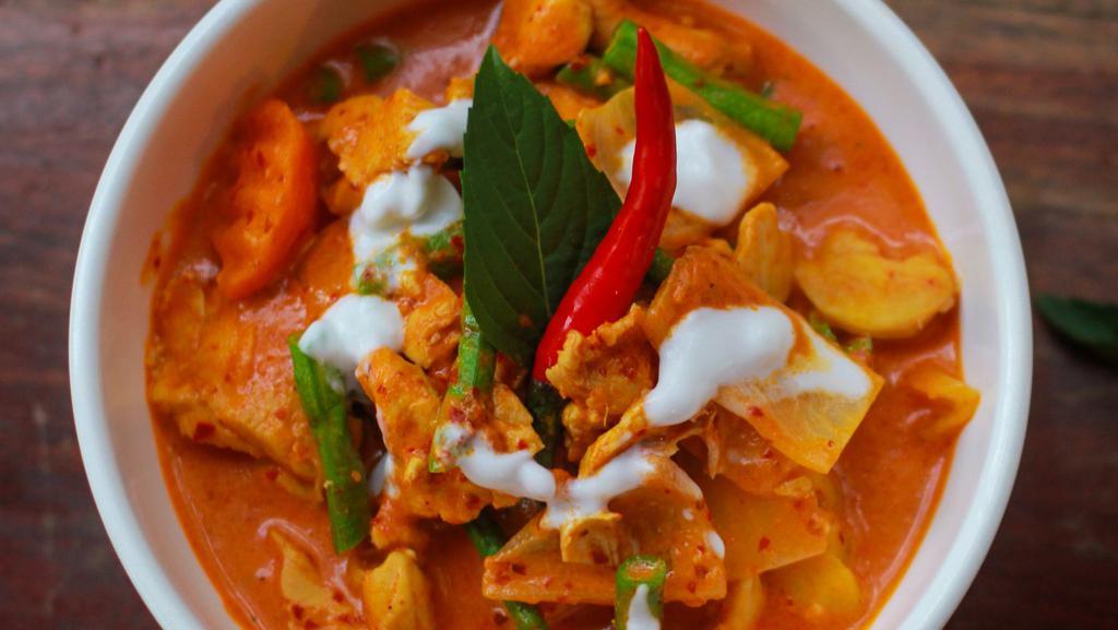 Panang Curry · Chilli paste, red bell pepper, coconut milk, string bean, carrot
