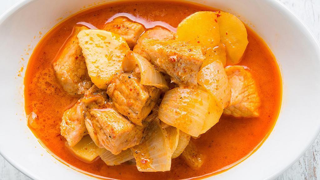Massamun Curry · Peanut, potato, onion, carrot, coconut milk with golden crispy onion