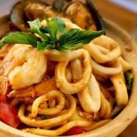Seafood Basil Udon Noodle · Udon Noodle, shrimp, squid, mussels, bamboo shoot, basil, red bell pepper, carrot, garlic, a...