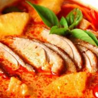 Lychee Siam Duck · Roasted duck breast, lychee, pineapple, tomato, red bell pepper, basil, with red curry sauce