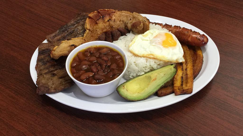 Bandeja Paisa · Typical colombian platter; grilled steak, pork skin, rice, beans, avocado, sausage and fried sweet plantain.