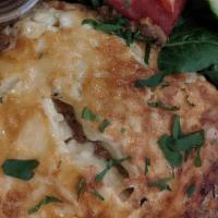 Moussaka · Layers of potatoes, grilled eggplant, zucchini and ground beef, topped with Bechamel sauce. ...