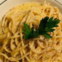 Spaghetti Cacio E Pepe · Spaghetti sauteed with Pecorino Romano and peppercorns