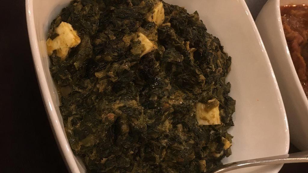 Palak (Spinach) Paneer · Cottage cheese and fresh spinach with fenugreek, ginger, and garlic.