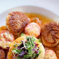 Roasted Sea Scallops · Roasted in Garlic & Parsley Butter with Braised Gigante Beans, Baby Onions &
Cherry Tomatoes...