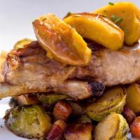 Grilled Pork Chop · Braised Savoy Cabbage, Crispy Potato Peelings, Pancetta, Grappa Apples
