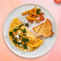 Greece Summer Scramble · Eggs, feta cheese, tomatoes, and onion. Served with home fries.