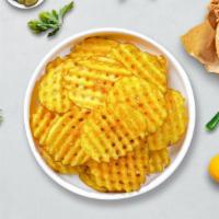Waffle Fries · (Vegetarian) Idaho potatos sliced in an alternating waffle pattern, fried until golden brown...