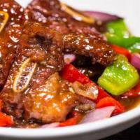 Charcoal Grilled Beef Short Ribs/炭烧牛仔骨 · Spicy.