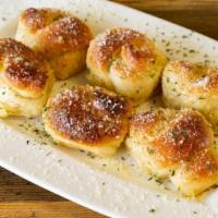 Cheesy Bread Roll · Soft pizza dough rolled around melty cheese, baked until golden brown.