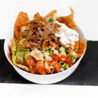 Nachos · Tortilla chips, choice of protein. Refried beans, nacho cheese, pico de gallo guacamole and ...