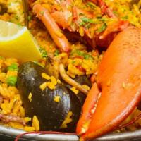 Paella Sangria · Lobster, shrimp, scallops, calamari, mussels, and clams.