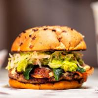 El Paso Burger · Roasted poblano peppers, sautéed onions, bacon, pepper jack cheese, guacamole, lettuce, and ...