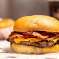 Trenton Burger · Grilled pork roll piled high with melted American cheese and ketchup on a deli bun.