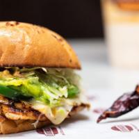 Spicy Baja Chicken Burger · Grilled chicken breast, topped with guacamole, jalapenos, pepper jack cheese, and lettuce a ...