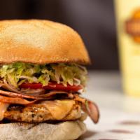 Cordon Bleu Burger · Boneless chicken breast, smoked ham, swiss cheese, lettuce, tomato, red onions, and honey mu...