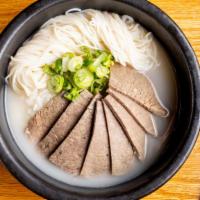 Seolleongtang · Milky broth made from ox-bone and brisket simmered over 24 hours to allow the flavor and nut...
