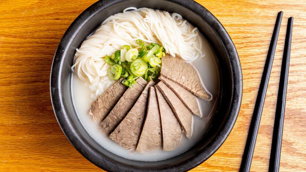 Seolleongtang · Milky broth made from ox-bone and brisket simmered over 24 hours to allow the flavor and nutrition to be gradually extracted from the bones. The soup is served with noodle, beef brisket and rice.
