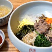 Gammeeok Bibimbop · White rice topped with cooked vegetables and ground beef.