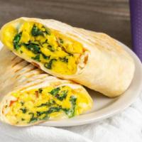 Breakfast Wrap · Scrambled eggs with salsa and melted provolone served in a flour tortilla.