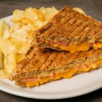 Grilled Cheese Panini · Cheddar cheese with tomatoes and creamy dijonnaise.