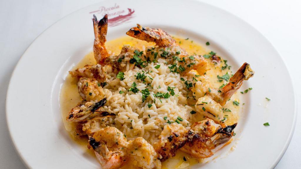Scampi Adriatico · Gulf shrimp broiled with white wine, garlic & lemon.