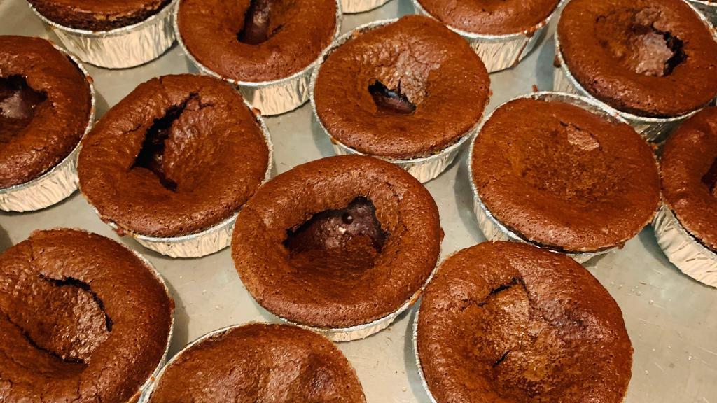 Warm Chocolate Vesuvio · Warm rich chocolate cake with molten liquid center