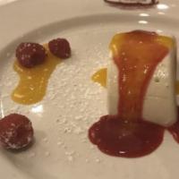 Panna Cotta · egg-less vanilla flan served with raspberry coulis