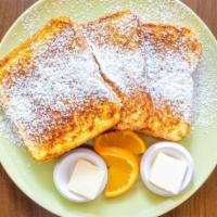 Traditional Flat Top French Toast · Three pieces of our thick sliced Texas toast.