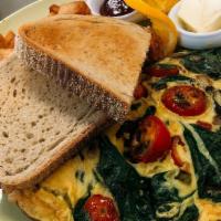 Vegetarian Omelet · Baby spinach, cherry tomatoes, mushrooms, peppers and onions.