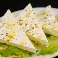 Feta Cheese · Greek feta cheese drizzled with EVOO and oregano