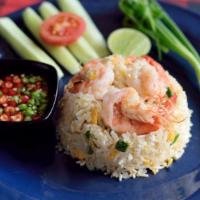 Khao Pad ( Fried Rice ) · Fried rice with choice of meat and eggs.