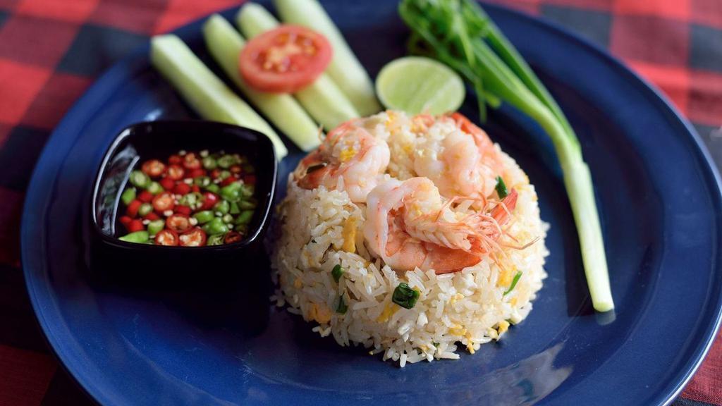 Khao Pad ( Fried Rice ) · Fried rice with choice of meat and eggs.
