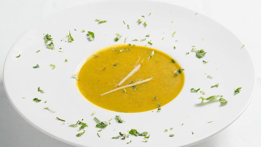Mulligatawny Soup · Traditional lentil soup flavored with herbs and mild spices