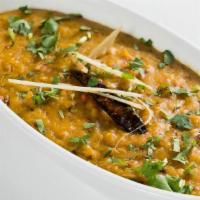 Yellow Daal Tadka · Slow simmered yellow lentils with onion and tomato