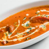 Butter Chicken · Dark meat chicken simmered in a tomato and buttery sauce